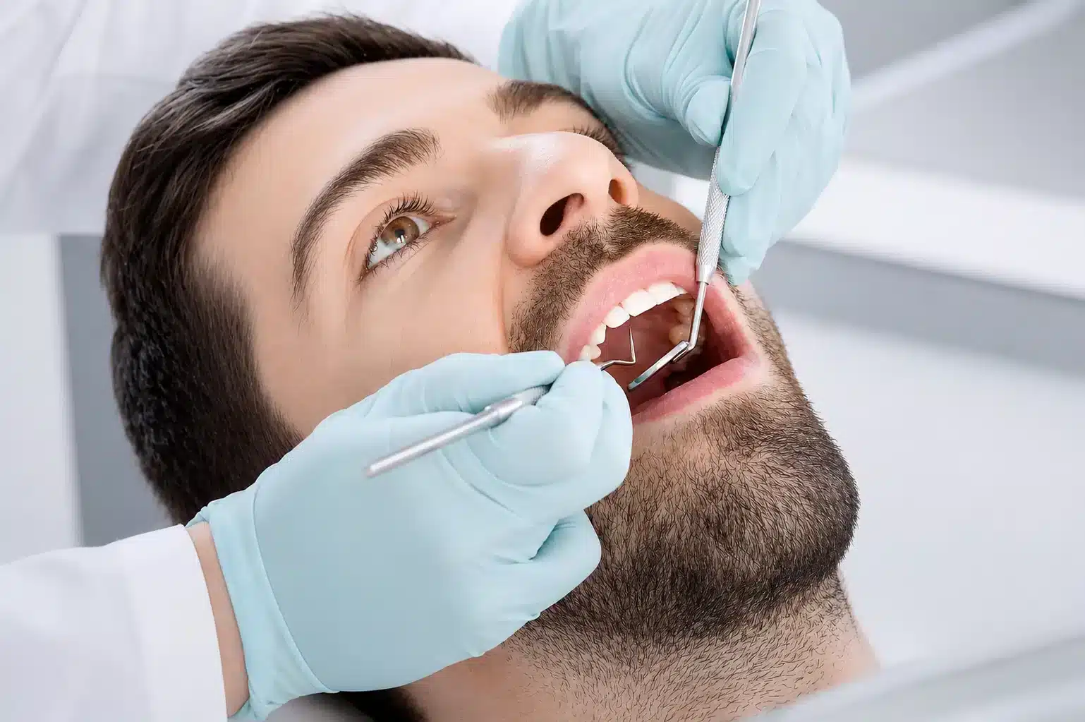 Dentist performing advanced dental treatment at the best dental clinic in Kochi